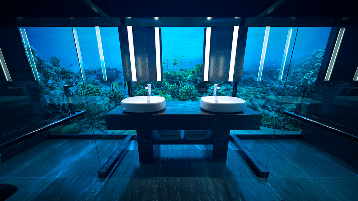 The underwater bathroom looks out onto the floor of the Indian Ocean