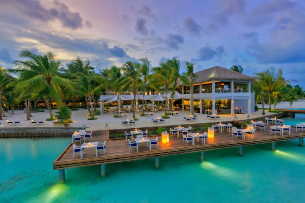 Kurumba Maldives - Facilities - Restaurant - Thila - Deck - Drone Evening